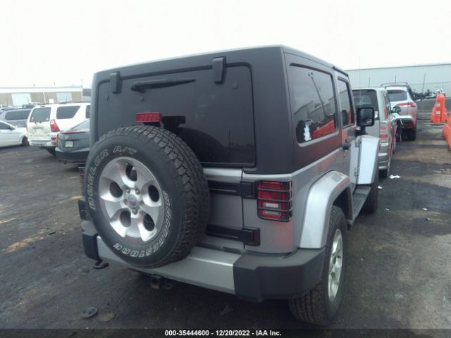 1C4GJWBG2EL318300 Jeep Wrangler Sahara