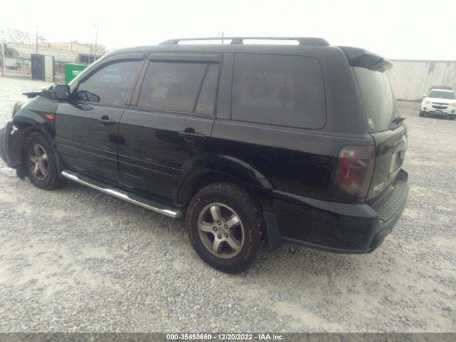 2007 HONDA PILOT EX-L VIN: 5FNYF18677B001660
