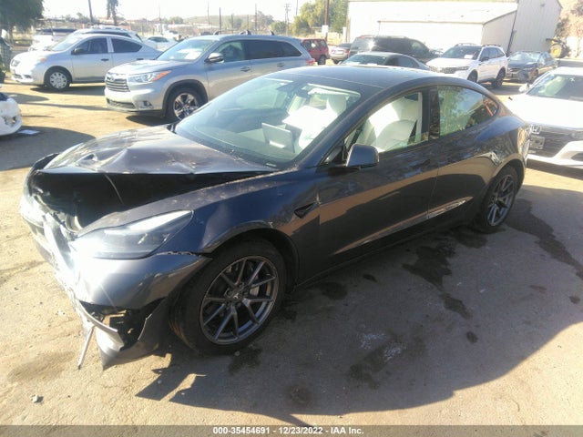Tesla MODEL 3 2021 5YJ3E1EBXMF875611 Image 2