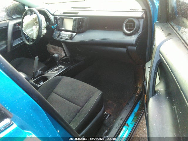 2018 Toyota RAV4, VIN: JTMRJREV1JD183089