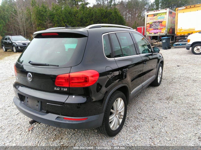 2013 VOLKSWAGEN TIGUAN SE W/SUNROOF & NAV VIN: WVGAV7AX1DW502251