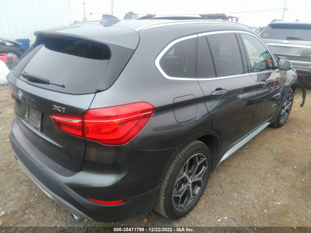 2016 BMW X1, VIN: WBXHT3Z35G4A49115