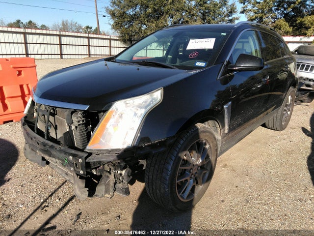 2015 Cadillac SRX, VIN: 3GYFNBE39FS518226
