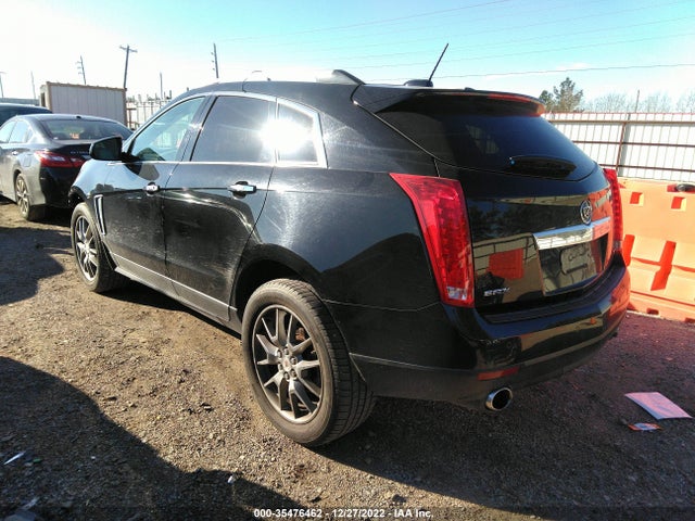 2015 Cadillac SRX, VIN: 3GYFNBE39FS518226