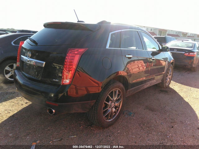 2015 Cadillac SRX, VIN: 3GYFNBE39FS518226