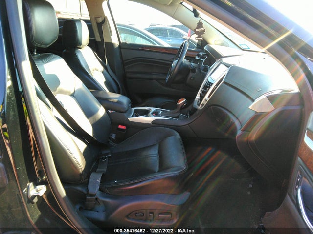 2015 Cadillac SRX, VIN: 3GYFNBE39FS518226