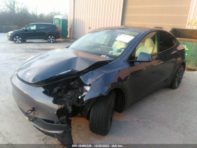 Tesla Model Y 2021 5YJYGDEFXMF073158 Image 2
