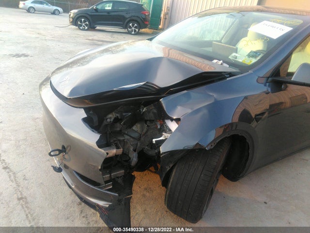 Tesla Model Y 2021 5YJYGDEFXMF073158 Image 7