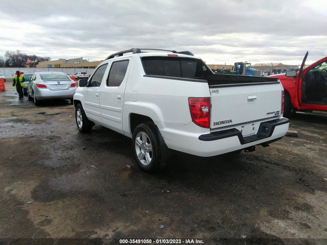 2011 HONDA RIDGELINE RTL VIN: 5FPYK1F58BB008879