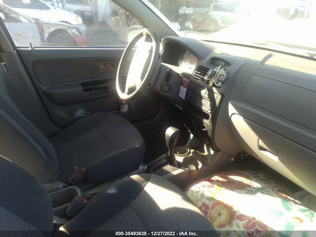 2003 KIA RIO VIN: KNADC125536264143