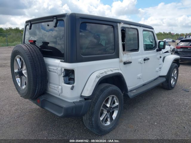 1C4HJXEN2JW295808 Jeep Wrangler Unlimited Sahara