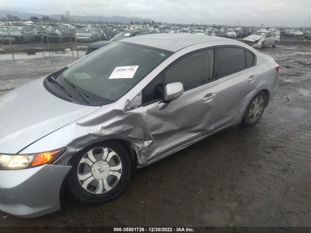 2012 HONDA CIVIC HYBRID VIN: JHMFB4F29CS004494