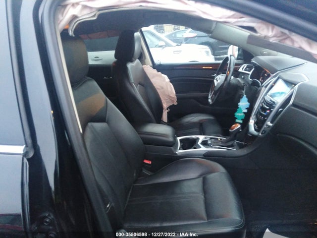 2014 Cadillac SRX, VIN: 3GYFNBE33ES609488