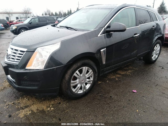 2014 Cadillac SRX, VIN: 3GYFNEE32ES587940