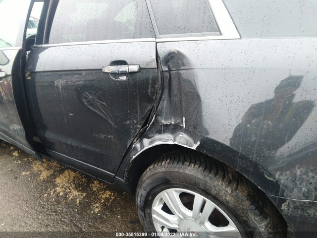 2014 Cadillac SRX, VIN: 3GYFNEE32ES587940