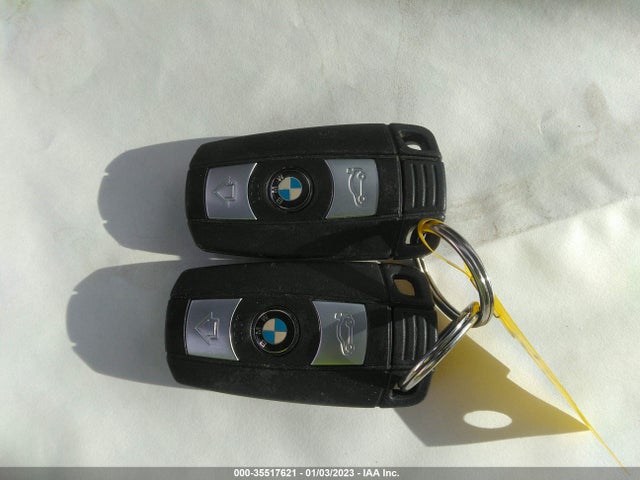 2014 BMW X1, VIN: WBAVM1C52EVW56036