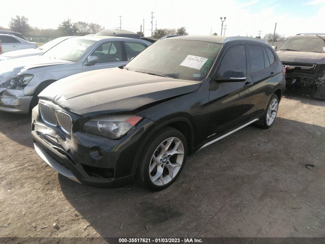2014 BMW X1, VIN: WBAVM1C52EVW56036