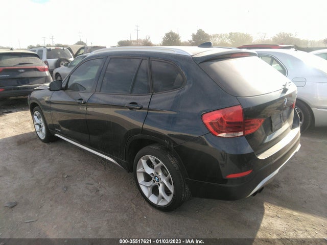 2014 BMW X1, VIN: WBAVM1C52EVW56036
