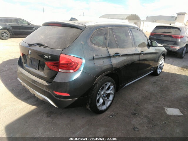 2014 BMW X1, VIN: WBAVM1C52EVW56036