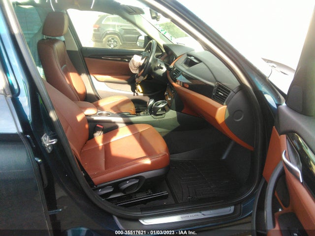 2014 BMW X1, VIN: WBAVM1C52EVW56036