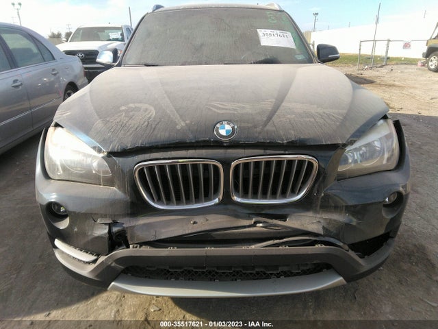 2014 BMW X1, VIN: WBAVM1C52EVW56036