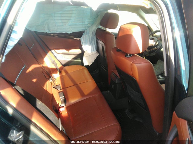 2014 BMW X1, VIN: WBAVM1C52EVW56036