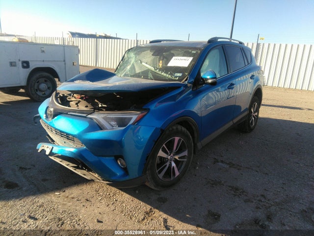 2018 Toyota RAV4, VIN: 2T3RFREV3JW788087