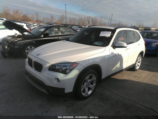 2014 BMW X1, VIN: WBAVM1C5XEVW56415