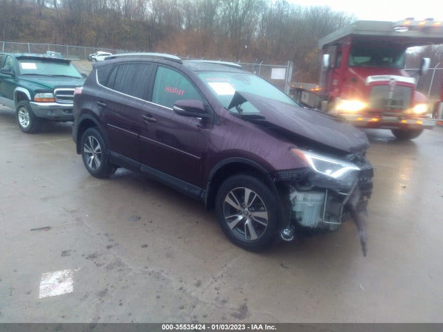 2018 Toyota RAV4, VIN: 2T3RFREV8JW836957