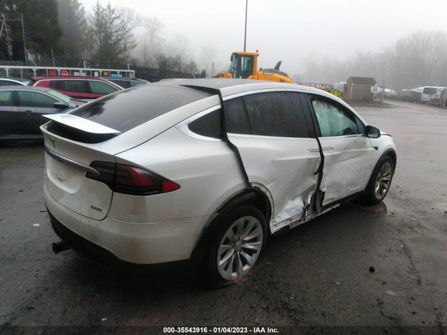2018 Tesla Model X, VIN: 5YJXCDE21JF100408