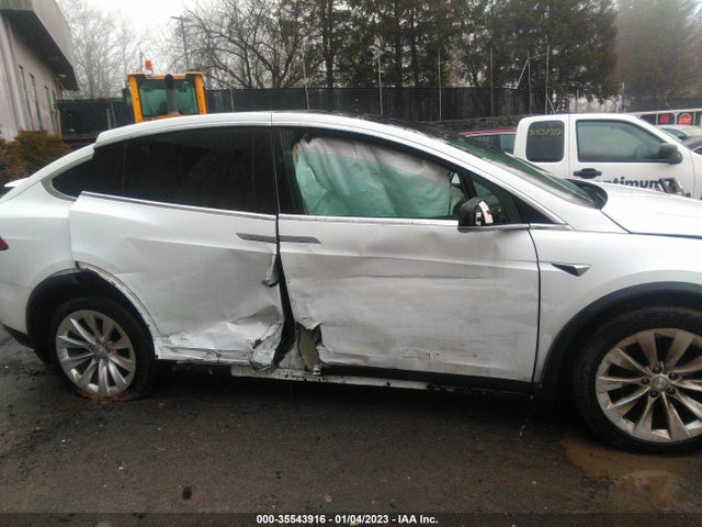 2018 Tesla Model X, VIN: 5YJXCDE21JF100408