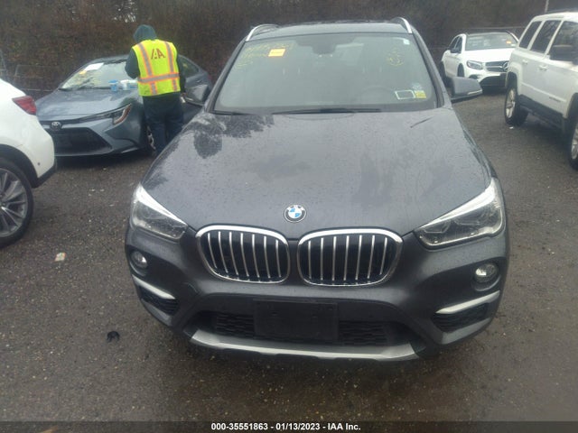 2017 BMW X1, VIN: WBXHT3C34H5F71772