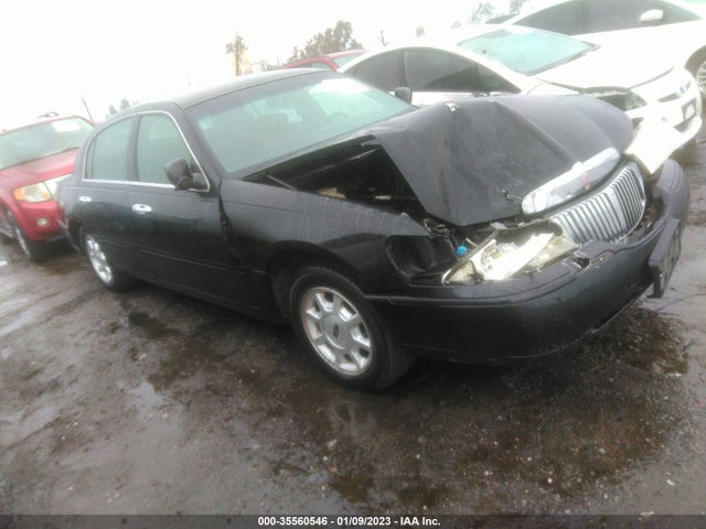 Lincoln Town Car Signature 2000 1LNHM82W8YY913847 главное изображение