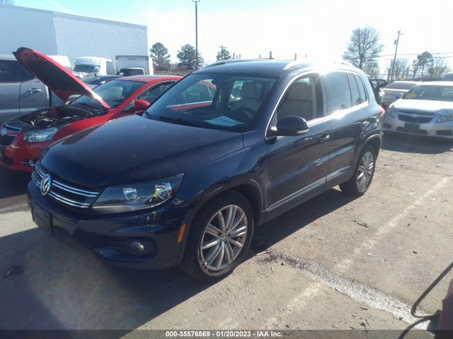 2013 VOLKSWAGEN TIGUAN SE W/SUNROOF & NAV VIN: WVGBV3AX7DW055292