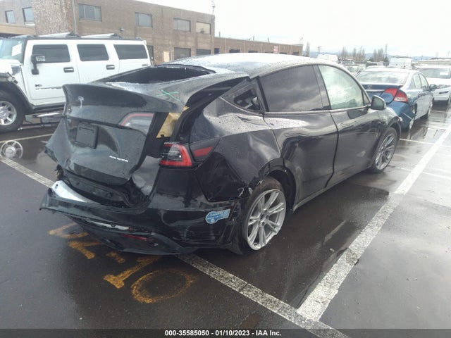 2021 Tesla Model Y, VIN: 5YJYGDEE8MF095909