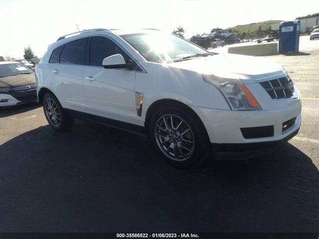 2015 Cadillac SRX, VIN: 3GYFNGE3XFS558277