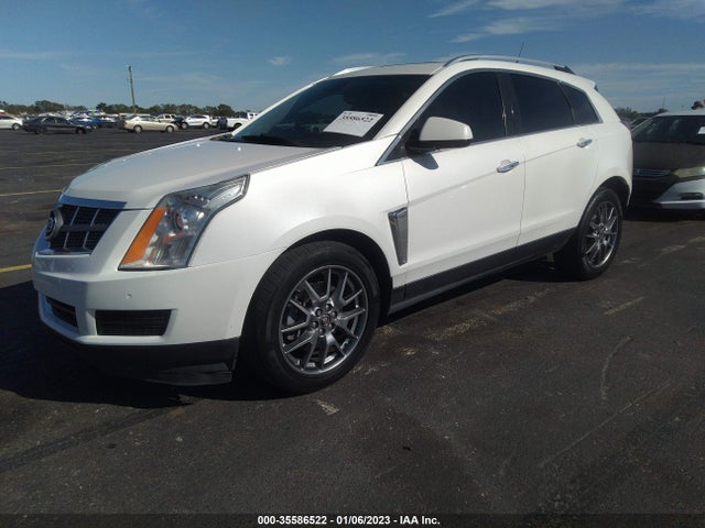 2015 Cadillac SRX, VIN: 3GYFNGE3XFS558277
