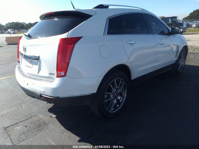 2015 Cadillac SRX, VIN: 3GYFNGE3XFS558277