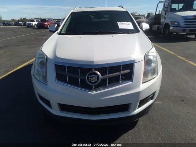 2015 Cadillac SRX, VIN: 3GYFNGE3XFS558277