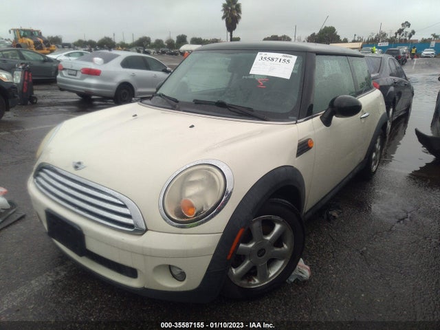 2010 MINI COOPER HARDTOP VIN: WMWMF3C55ATZ65992