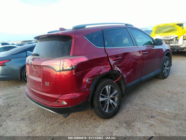 2018 Toyota RAV4, VIN: 2T3RFREV5JW702133