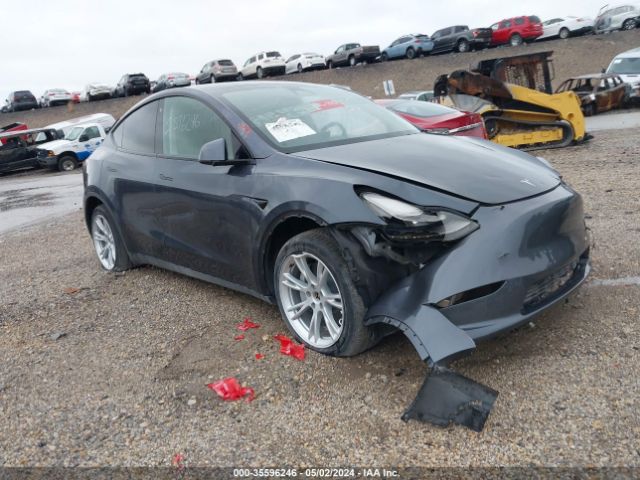 Продаж на аукціоні авто 2023 Tesla Model Y Awd/long Range Dual Motor All-wheel Drive, vin: 7SAYGAEE4PF595409, номер лоту: 35596246