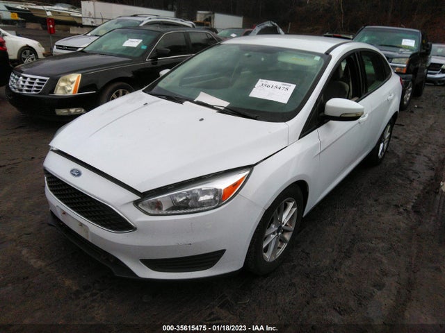 2016 Ford Focus, VIN: 1FADP3F24GL273495