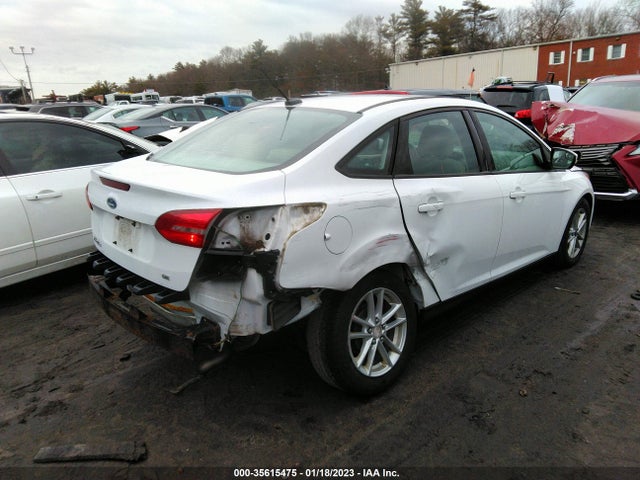 2016 Ford Focus, VIN: 1FADP3F24GL273495
