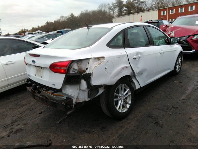 2016 Ford Focus, VIN: 1FADP3F24GL273495