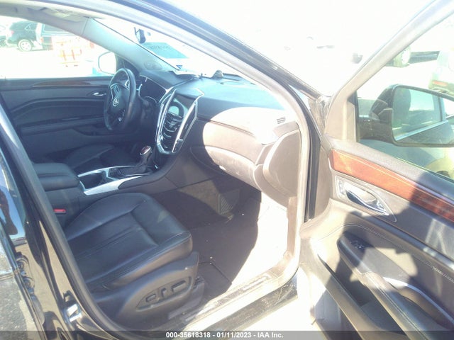 2014 Cadillac SRX, VIN: 3GYFNBE3XES548334