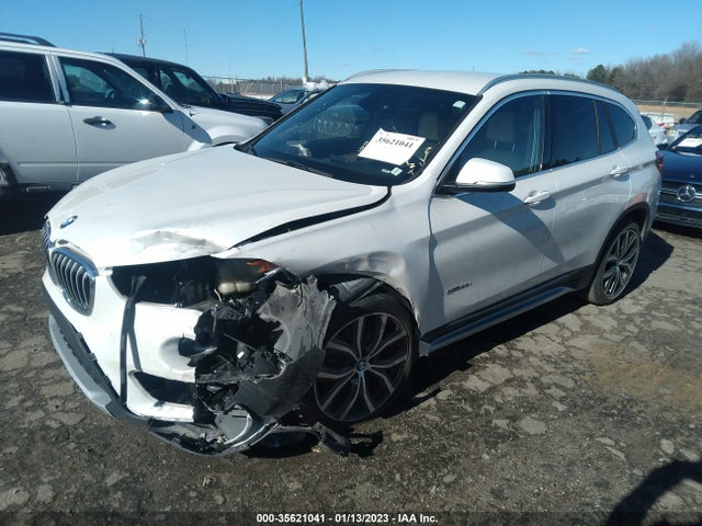 2017 BMW X1, VIN: WBXHU7C37H5H36007
