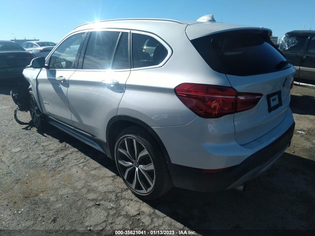 2017 BMW X1, VIN: WBXHU7C37H5H36007