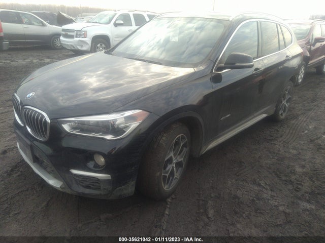 2016 BMW X1, VIN: WBXHT3Z32G4A49640