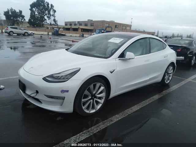 2018 Tesla 3, VIN: 5YJ3E1EB0JF135531